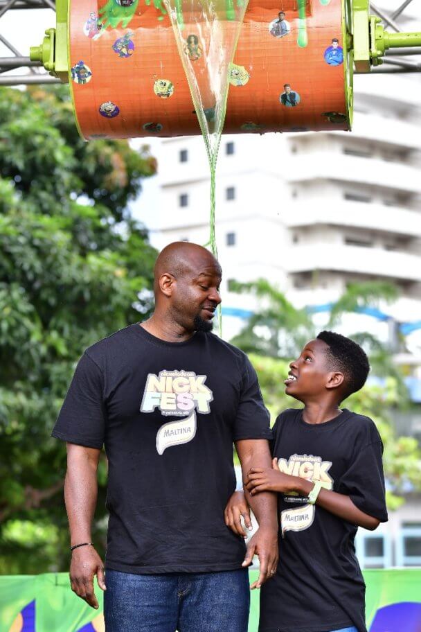 Alex Okosi and son at Nickfest